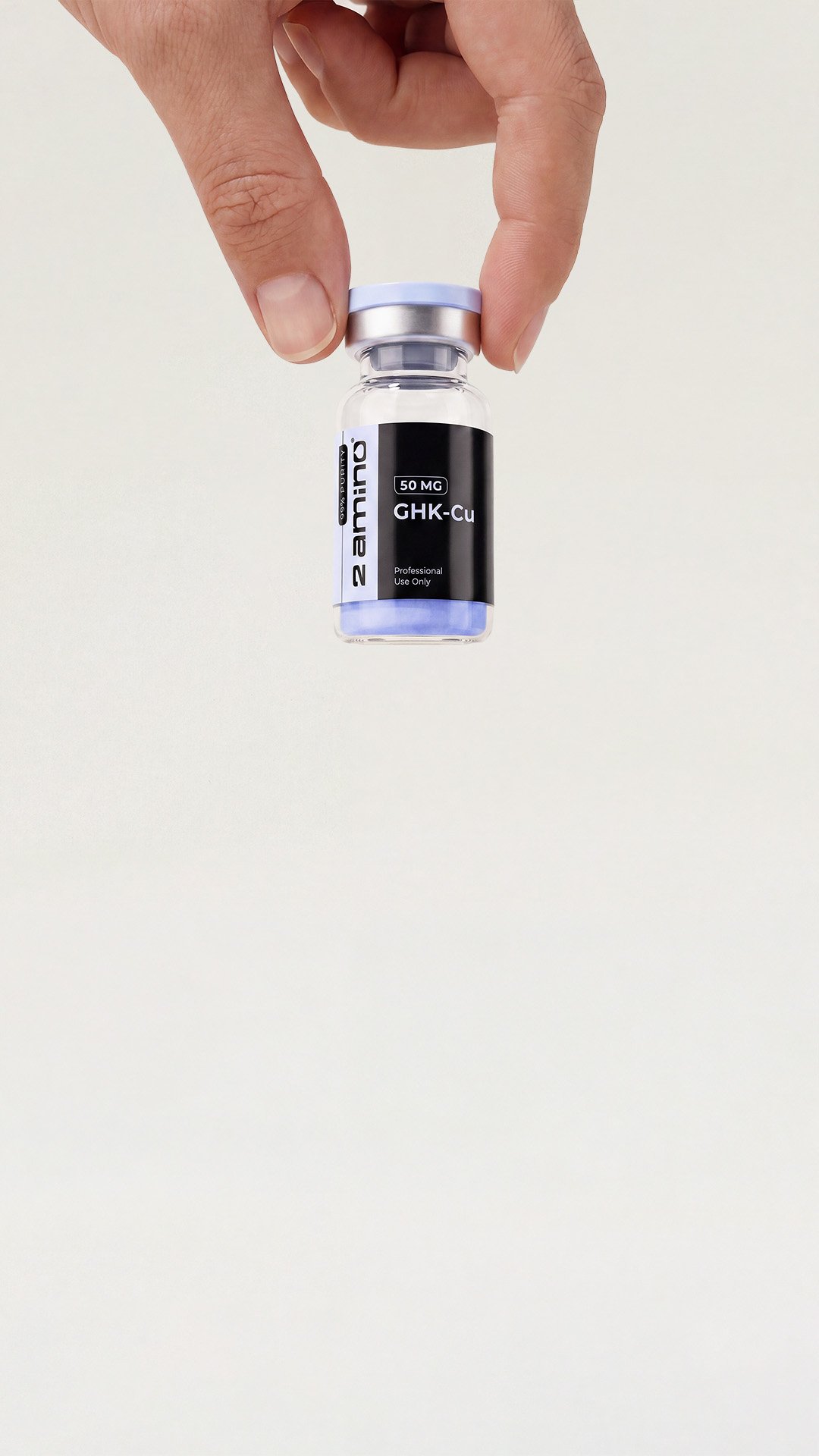 Hand holding a 2amino GHK-Cu research vial